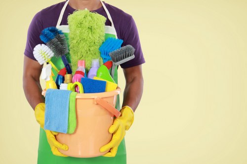 Office cleaners in Wimbledon working in a modern office reception area