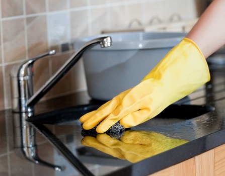 Workers in a cleaning service setting representing ethical labour oversight