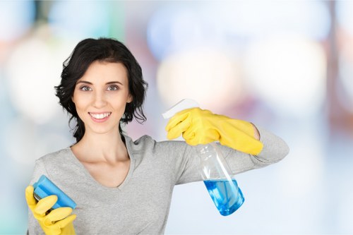 Trained cleaner wearing PPE during a Wimbledon cleaning job