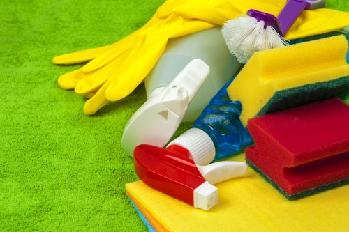 Domestic cleaner vacuuming carpet in Wimbledon