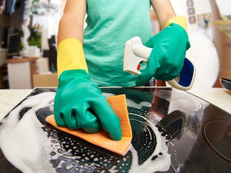 Oven racks and trays being deep cleaned in Wimbledon